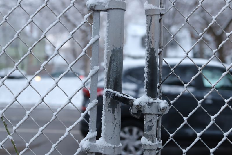 Winter Iron Fence Repair